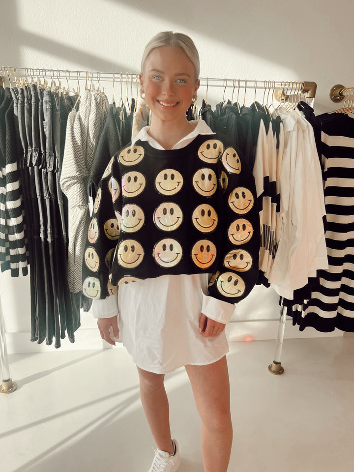 QOS Scattered Smiley Face Sweatshirt