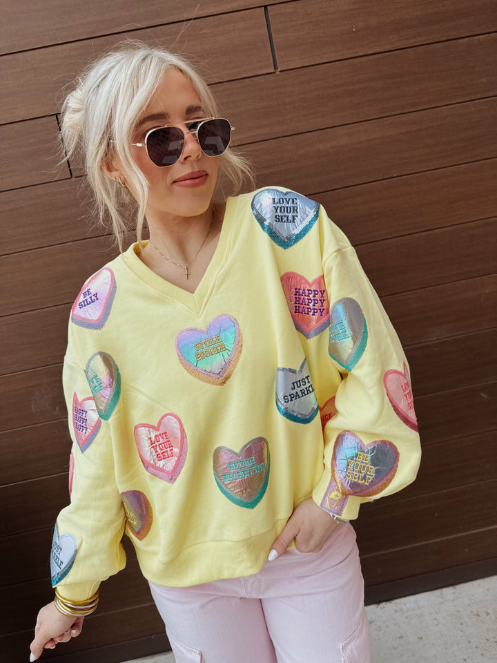 QOS Pale Yellow Positive Candy Hearts V-Neck Sweatshirt