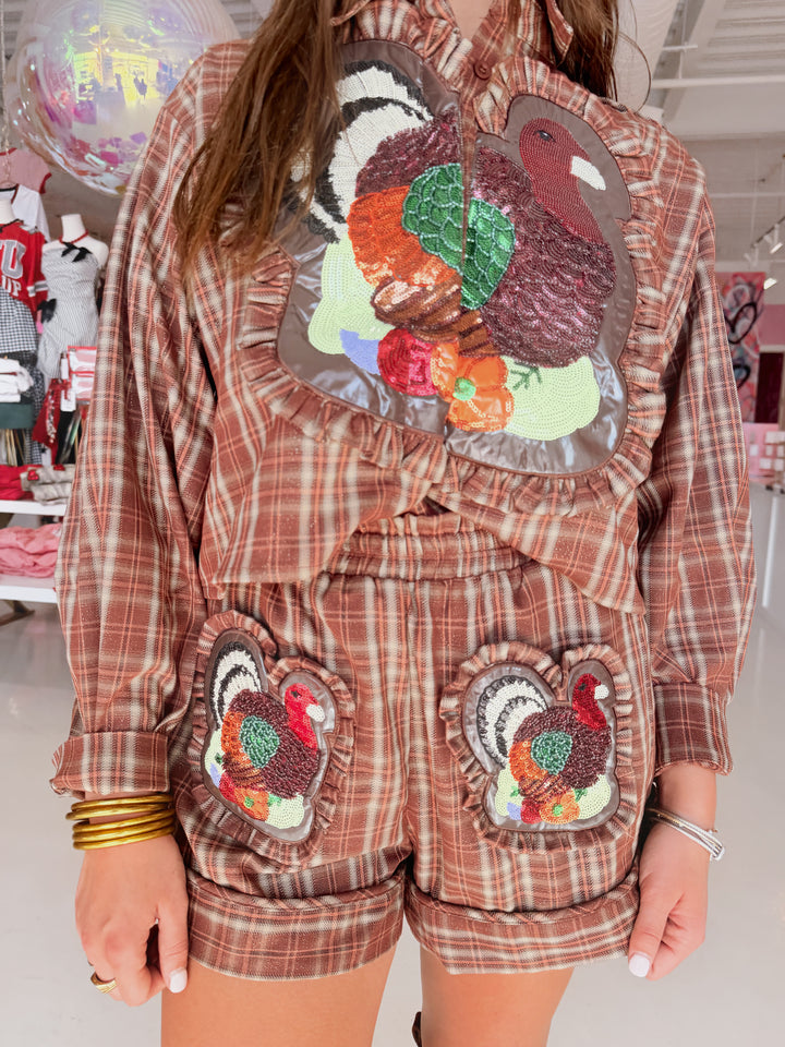QOS Brown Plaid Turkey Ruffle Button Up Top